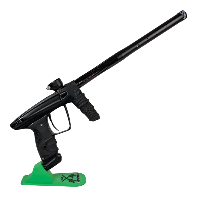 Close-up of a new DLX Luxe X Paintball Gun on a stand, ready for play.
