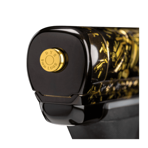 Spent Series 9mm Bolt Button in gold and black aluminum for paintball markers.